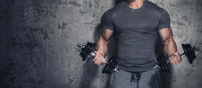 a man holding weights 